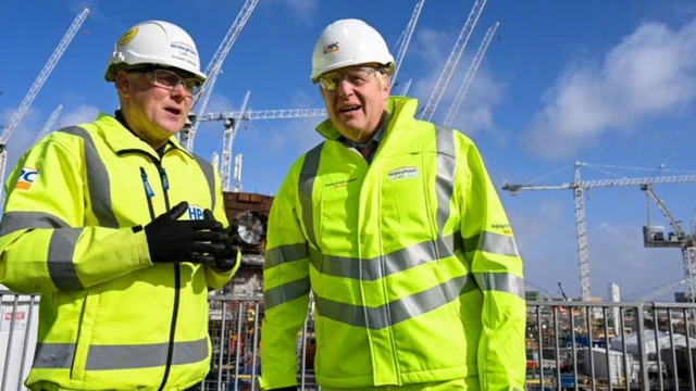 Boris Johnson (right) during a visit to construction works at the Hinckley Point plant