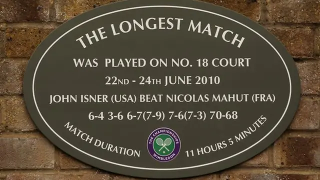 A plaque on court 18 at Wimbledon that commemorates the 2010 Wimbledon first-round match between John Isner and Nicolas Mahut