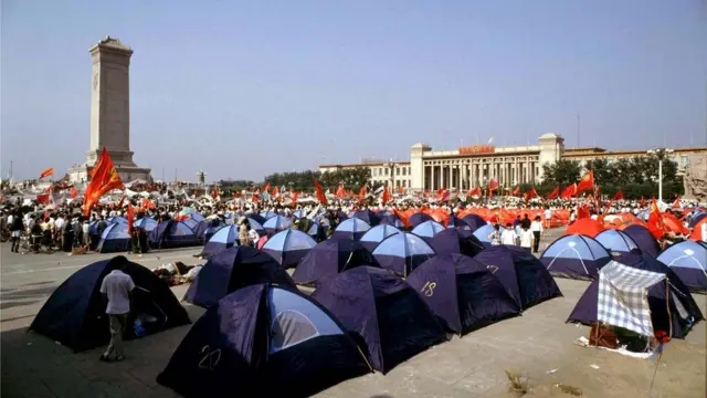 Pro-democracy demonstrators pitch tents in Beijing"s Tiananmen Square before their protests were crushed by the People"s Liberation Army in this June 3, 1989 file photo. June 4 marks the 25th anniversary of the suppression of pro-democracy protests in Tiananmen Square in 1989. Picture taken June 3, 1989. REUTERS/Bobby Yip/Files