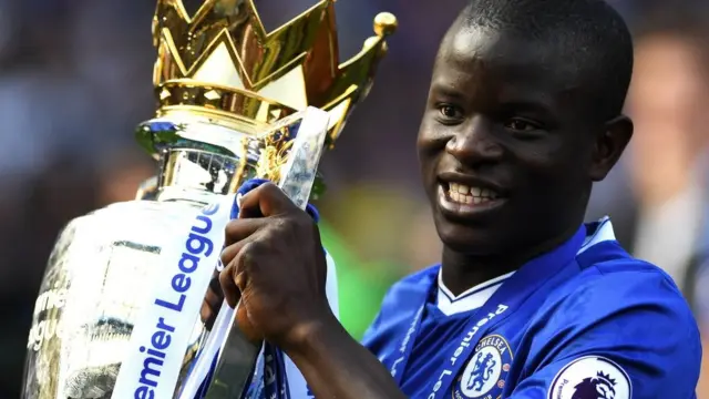 N'Golo Kante lifts the Premier League trophy