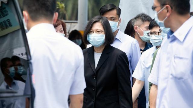 Taiwan President Tsai Ing-wen visits a funeral parlour a day after a deadly train derailment in a tunnel north of Hualien, Taiwan April 3, 2021.