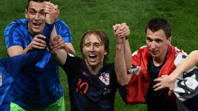 Croatia midfielder Luka Modric (centre) was charged with perjury in June