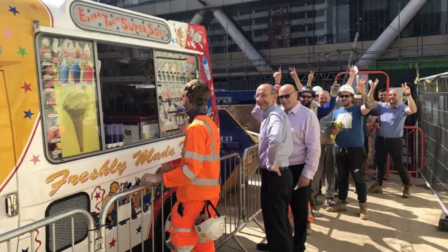 Builders queuing for ice cream