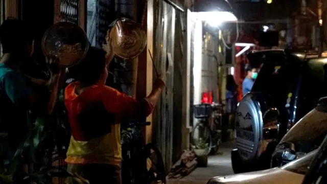 Yangon residents bang pots and pans