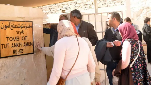 People gather outside the newly restored tomb of King Tutankhamun in the Valley of the Kings, Egypt (31 January 2019)