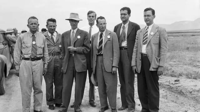 Oppenheimer (standing third, left to right) with fellow nuclear scientists near New Mexico