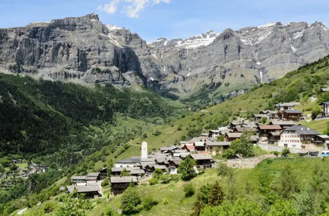 Traditional Swiss Alpine village showing peaceful community environment