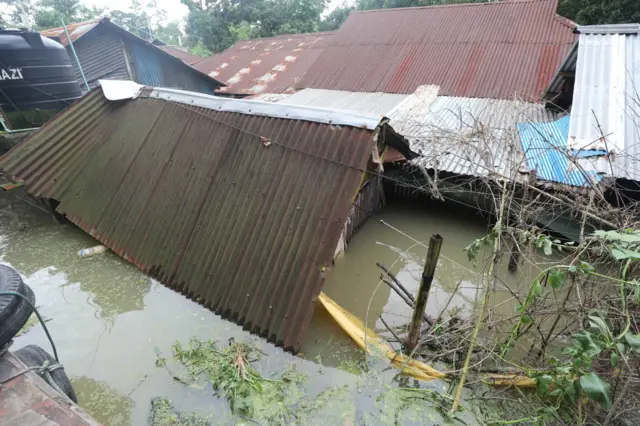 ফেনীতে বহু ঘর পানিতে তলিয়ে গেছে।