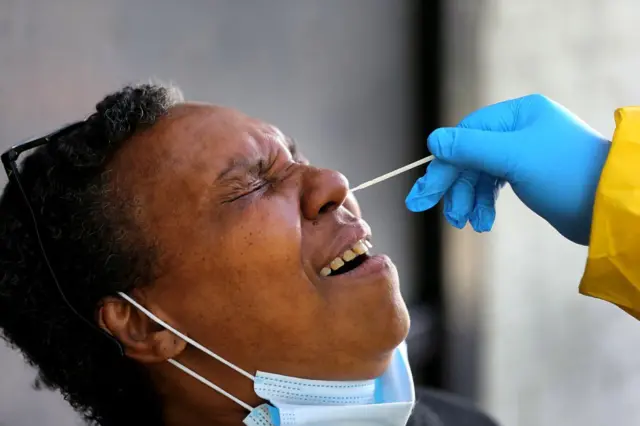A woman having a swab test