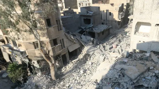 Разбомбленный дом, в котором жила семья Омрана