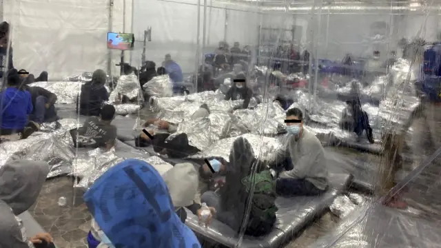 Migrants at the US Customs and Border Protection temporary processing centre in Donna, Texas, 22 March 2021