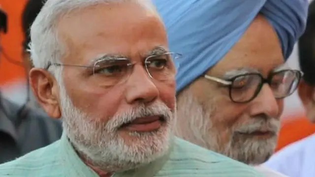नरेंद्र मोदी, मनमोहन सिंह