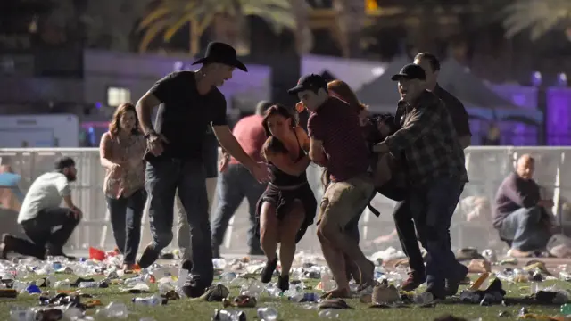 Survivors flee gunfire in Las Vegas, Nevada, 1 October 2017