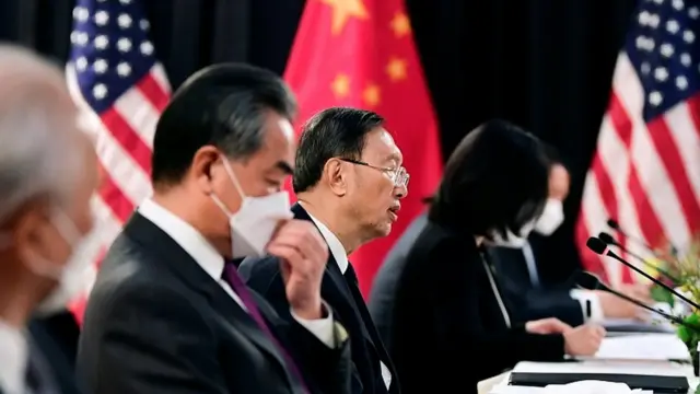 Yang Jiechi (c), and Wang Yi at the Alaska talks. 18 March 2021