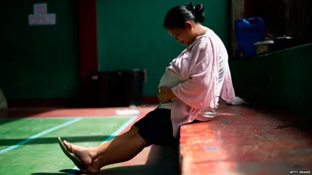 pregnant women sitting