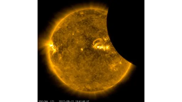 Image of the Moon transiting across the Sun, taken by SDO in 171 angstrom extreme ultraviolet light on Aug. 21, 2017.