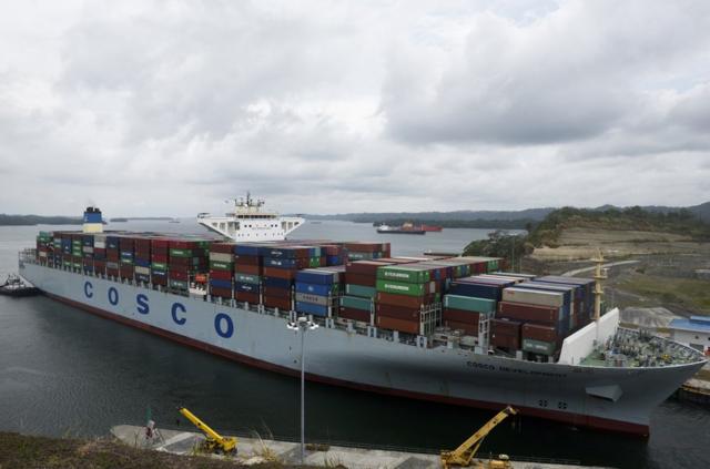 Container ship Cosco Development, registered and sailing under the flag of Hong Kong, with capacity for more than 13,000 containers, is seen at the Agua Clara locks in Colon, 90 km from Panama City on May 2, 2017. The Cosco Development became Thursday the largest ship to cross the Panama Canal. / AFP PHOTO / RODRIGO ARANGUA (Photo credit should read RODRIGO ARANGUA/AFP/Getty Images)