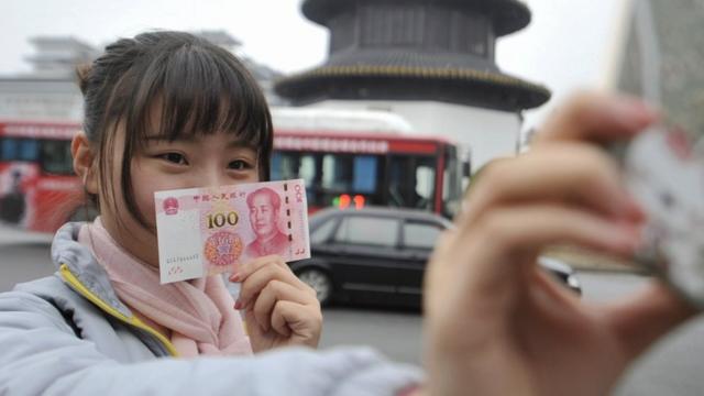 Hiện đồng xu tiền Trung Quốc sử dụng phụ thân mã ký hiệu vô thanh toán.