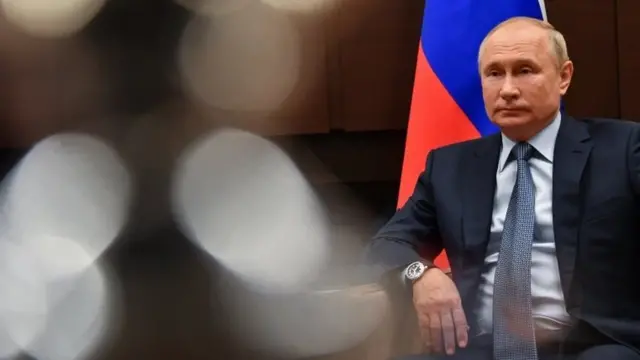 Путин