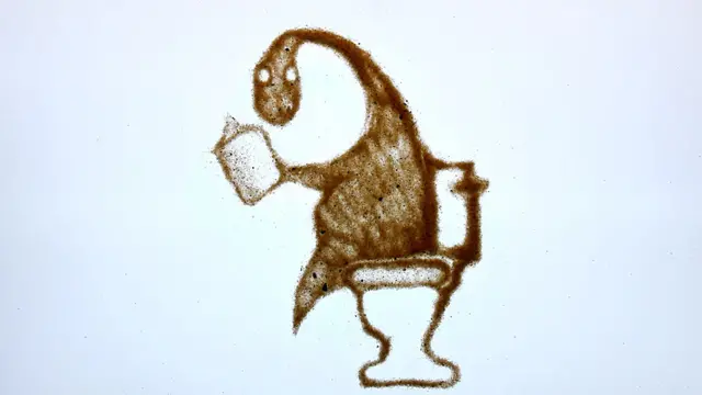 Dinosaurio en inodoro