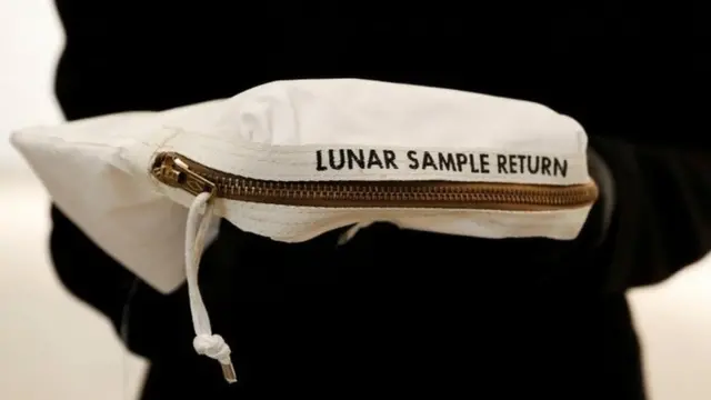 The bag used to collect samples of the Moon is displayed at Sotheby's