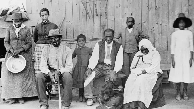 Harriet Tubman com alguns dos escravos que ajudou a libertar