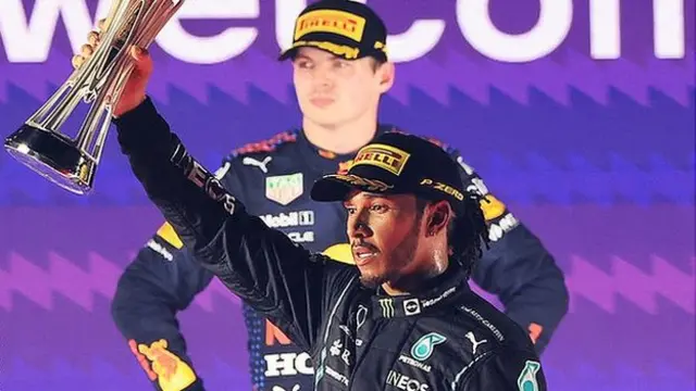 Lewis Hamilton celebrates victory at the Saudi Arabian Grand Prix, with Max Verstappen behind
