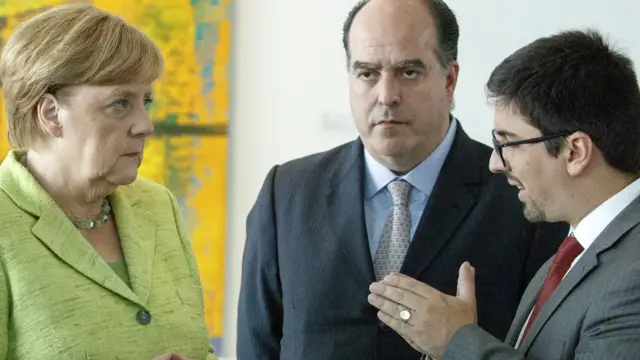 Angela Merkel, Julio Borges y Freddy Guevara.