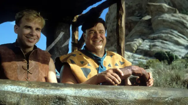 Rick Moranis and John Goodman in The Flintstones