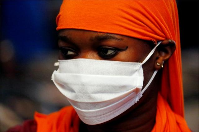 NIGERIAN LADY USED NOSE MASKS TO MAKE BRA