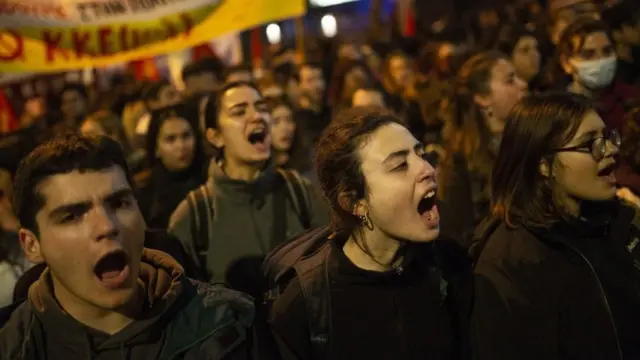 Protesters outside the offices of Hellenic Train in Athens on 1 March