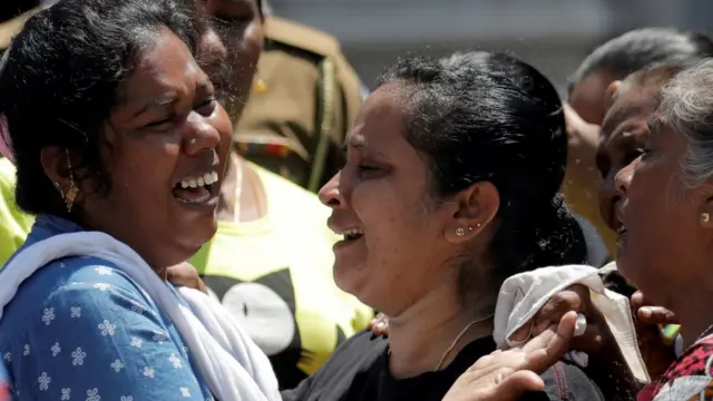 Mourning relatives of the victims
