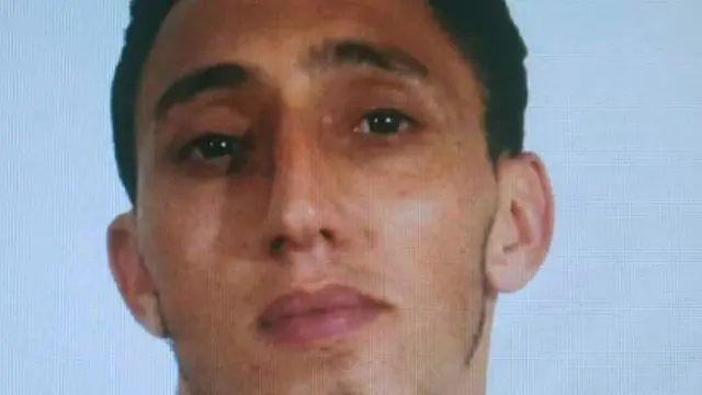 صورة نشرتها الشرطة لإدريس أوكبير الذي استخدمت وثائق هويته لاستئجار سيارة نقل البضائع