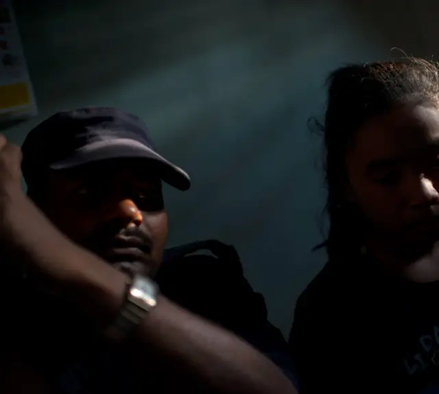 A policeman with a suspected trafficking victim