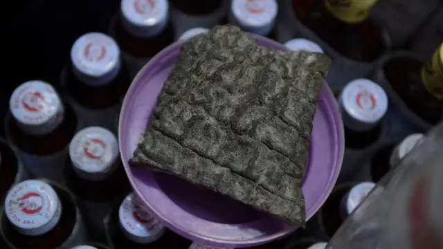 A chunk of dried elephant is displayed at the traditional medicine shop in Mon State