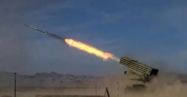 A missile leaves its launcher