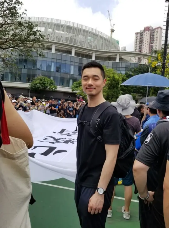 Wilson Leung, một luật sư trẻ thuộc Progressive Lawyers Group tại Victoria Park trước giờ xuất phát