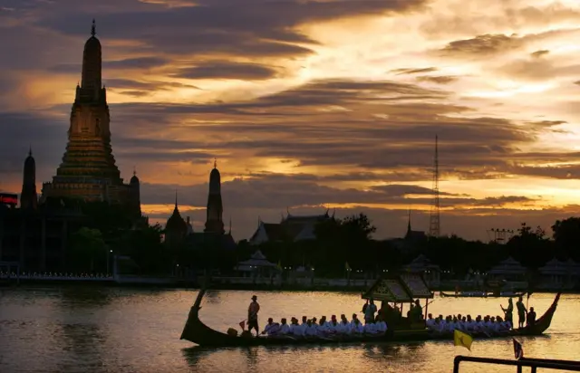 The Thai Royal Barge procession cruises down the Chao Praya river celebrating the 60th anniversary celebrations of Thailand King Bhumibol Adulyadej accession to the throne on June 12, 2006