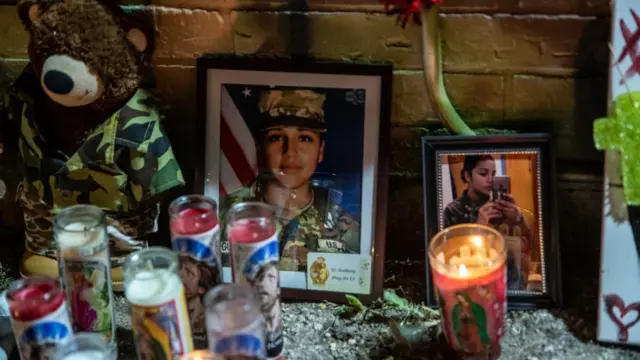 foto de vanessa guillen junto a velas en un mural en homenaje a ella en Austin Texas