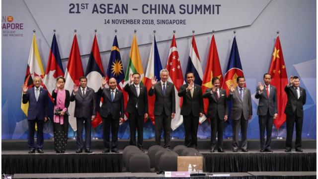 ASEAN leaders gather for the family photo during the 21st ASEAN China Summit held in Singapore on November 14, 2018.