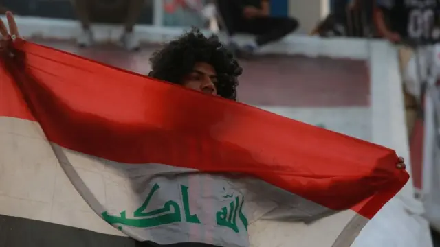 متظاهر في العراق
