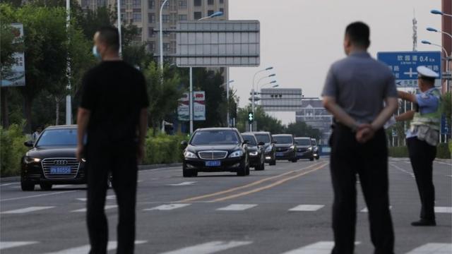 A convoy of vehicles arrives to a hotel where U.S. Deputy Secretary of State Wendy Sherman is expected to meet Chinese officials, in Tianjin, China July 25, 2021. Picture taken July 25, 2021.