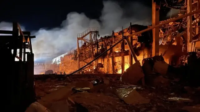 A night scene of damaged buildings in Odesa
