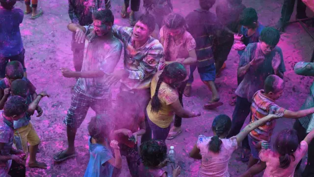 আত্মীয়স্বজন বন্ধুবান্ধব নিয়ে রঙ খেলা।