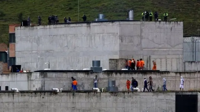 Inmates could be seen on the roof of El Turi jail in Cuenca