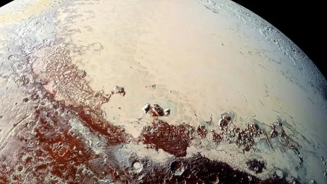 Pluto's Sputnik Planitia glacier is primarily made from nitrogen ice, and contains thousands of pits suspected to be caused by floating islands of water ice (Credit: Alamy)