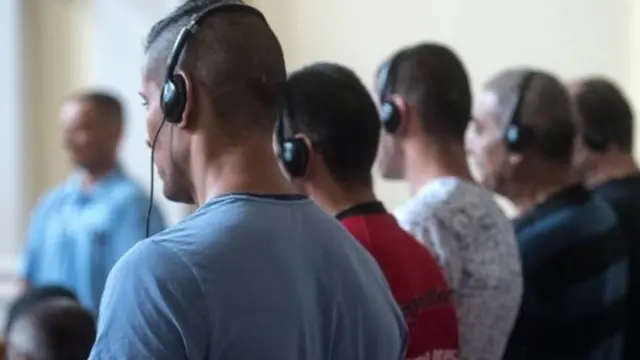 terdakwa penyelundup migran.