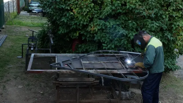 сварщик Романов