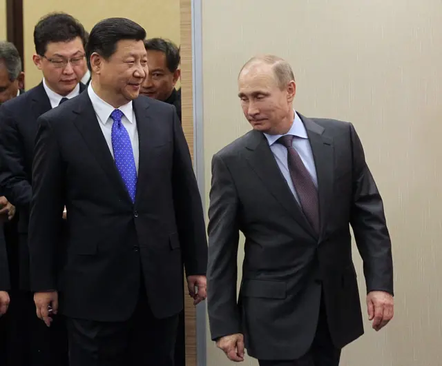 بوتين وتشي جي بينغ