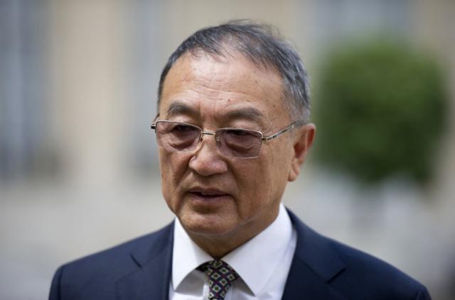 Chinese computer giant Lenovo chairman Liu Chuanzhi leaves the Elysee presidential Palace on June 25, 2013 in Paris after a meeting with French president. AFP PHOTO / FRED DUFOUR (Photo credit should read FRED DUFOUR/AFP/Getty Images)
